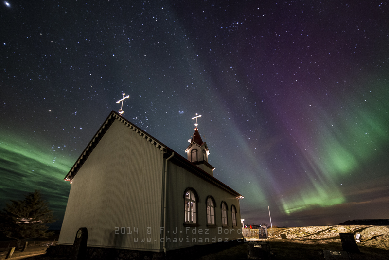 Winter Icelandic landscape with Northern lights background. Iceland