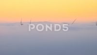 132129452-windpower-farm-time-lapse-over